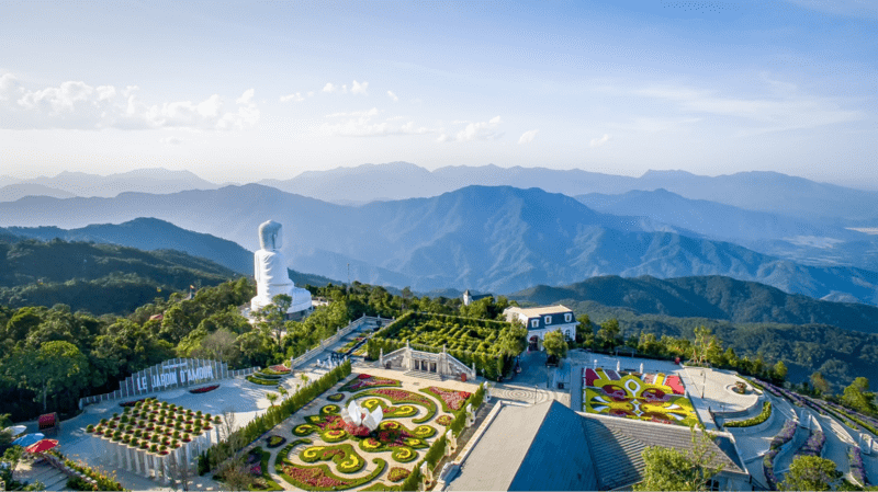 Panoramic view of the colorful Le Jardin D'Amour flower garden on the slopes of Ba Na mountain